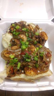 Mudsugars Spud; customer added shrimp, grilled chicken, provolone cheese, and green onions