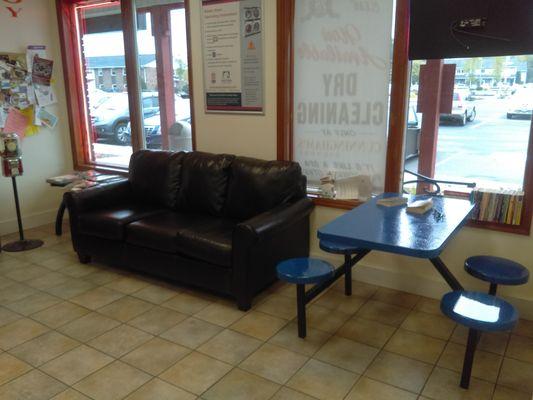 Comfy couch and table for lunch - chinese restaurant next door.