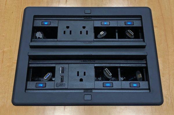 Mechanical Crestron connections boxes make your conference room technology neat and tidy.