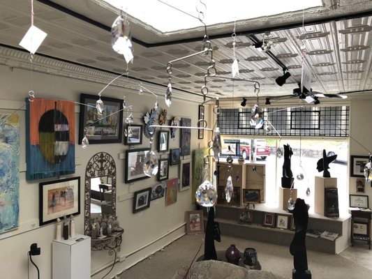 Looking at the rotating wall of local artists.