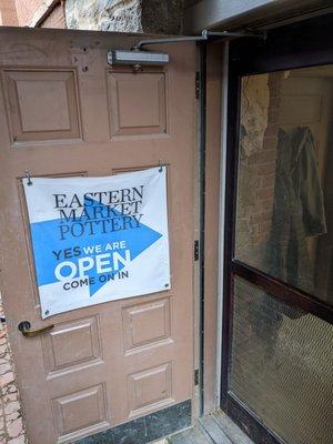 Entry to Eastern Market Potter on the south side going down o the basement.