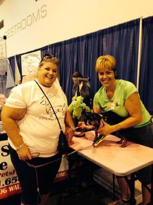 Clipping nails at the dog show to raise money for Dog Rescue