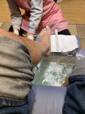 Getting a pedicure.