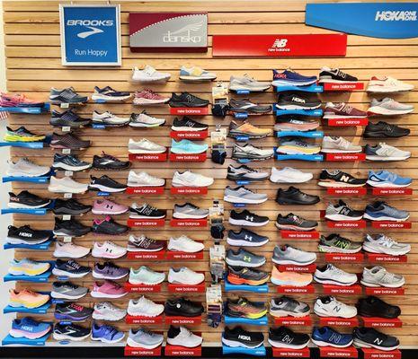 Sneaker wall. 
Hoka 
New Balance 
Brooks 
Under Armour