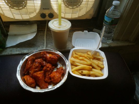 Sweet and spicy chicken wings, fries and peanut butter and banana shake