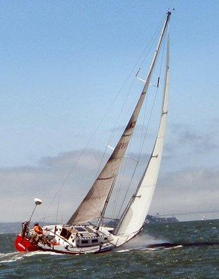 Red Dress sailing toward the Golden Gate