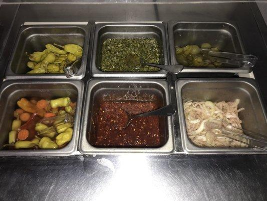 The spice or topping station from mana mana Mediterranean falafel grill, Soho, South Tampa