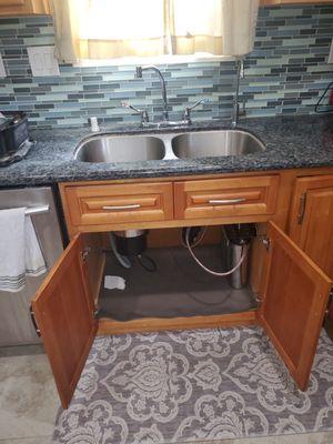 Complete new installation of main sink faucet, dedicated drinking water faucet and under-sink filter system