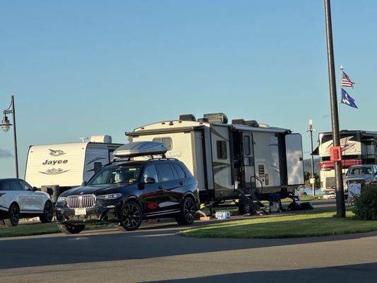 Our Turnkey RV behind the blue SUV made the perfect home for 10 days at Winchester Bay RV Park.