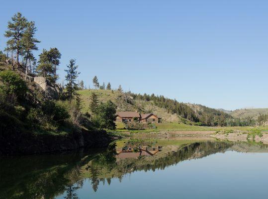 Lodge mirrored in the pond