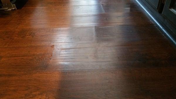 Water damage on wood flooring in Broken Arrow