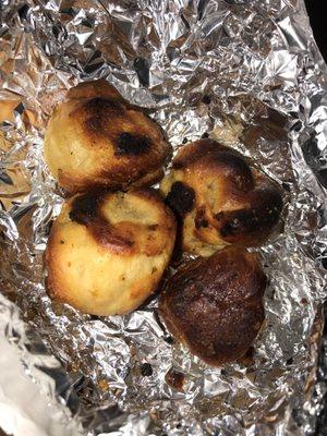 Garlic knots. I didn't ask for well done.