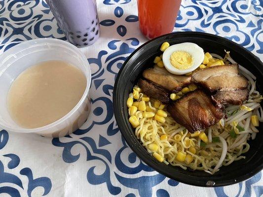 Pork ramen with the broth container that spilled during delivery.