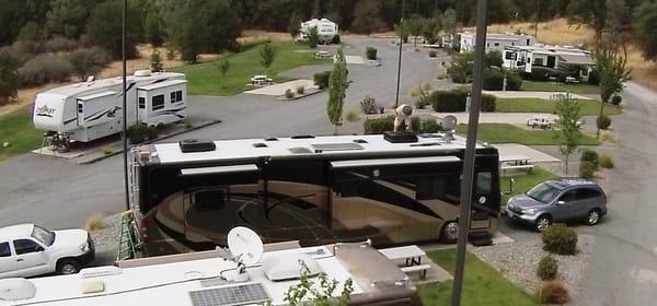 Andy Chrisler is working on the satellite dish on this motor coach.