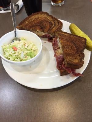 Reuben Sandwich grilled to perfection and loaded with Corned Beef!!  With cole slaw on the side:  Delicious!!