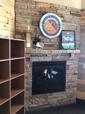 Fireplace in lodge, cubby's for storage