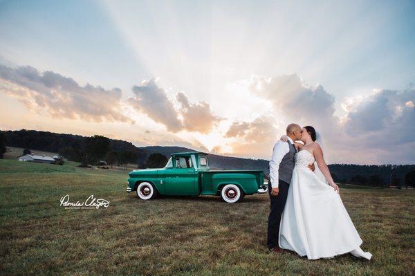 Bride and Groom with sunset at Bilbrey Farms