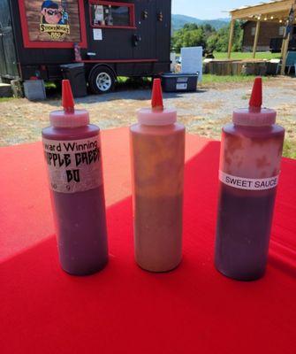 Cripple Creek BBQ sauce, Sticky Nick's mustered BBQ sauce, and Sticky Nick's sweet BBQ sauce