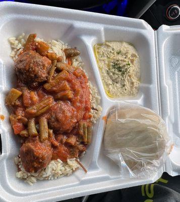 Hummus, pita bread, and green beans and meatballs in sauce over rice