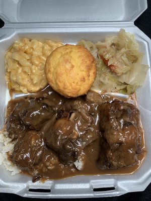 Smoked Oxtails Special with cabbage and macaroni and cheese