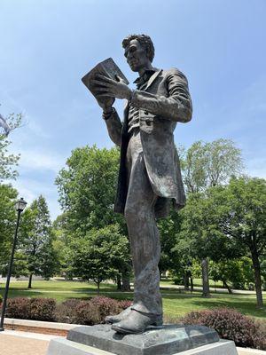 Abe Lincoln can be found in front of the library