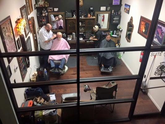 Derek and Brooke hard at work in True Barbershop.