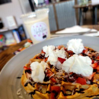 Waffle strawberry, coconut ,chocolate drizzle  and whipped cream