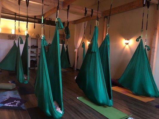 Savasana in the supportive Aerial Hammocks!