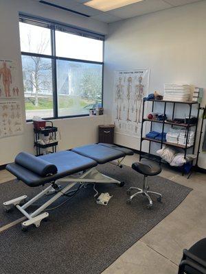 Chiropractic treatment room. Extra large table to perform dry needling and other rehab therapies