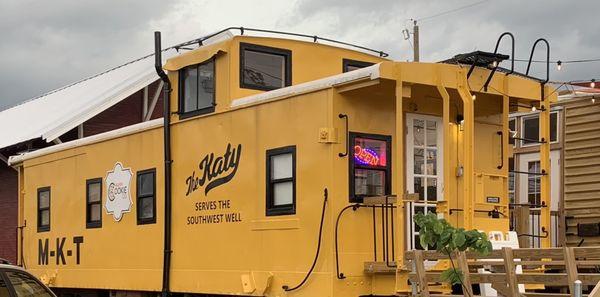 Our Yellow Caboose on MK&T railroad tracks