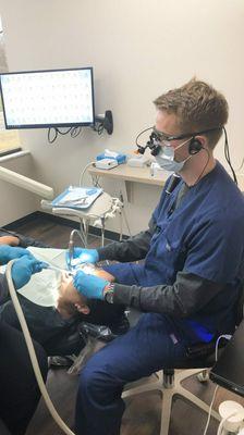 Dr. Landgraf and patient - STL Mid-County Dental