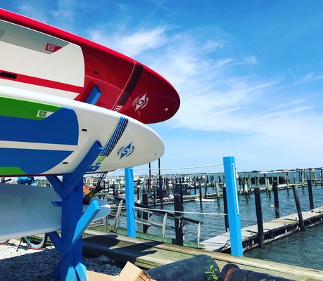 Brand new paddle boards just waiting to be used.