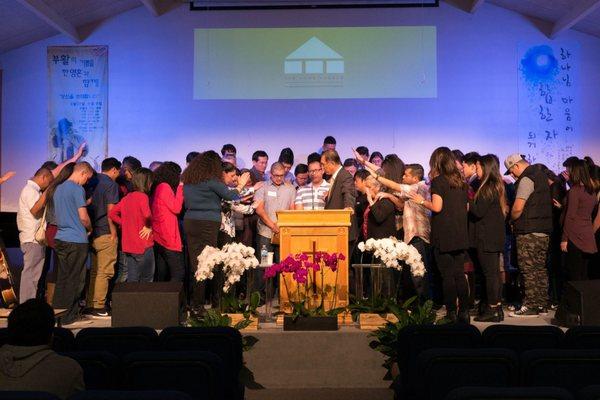 Installment service of new pastor and merge of 2 churches.