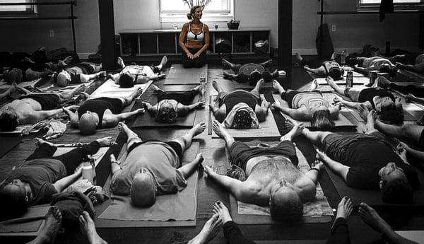 Dana Rae Paré leading savasana at Thanksgiving Benefit