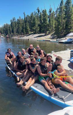 15 People on a Giant Stand up Paddleboard!!