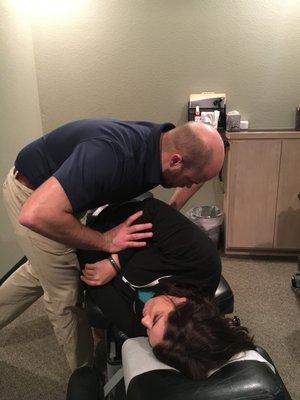 Dr. Andrew providing Chiropractic care.