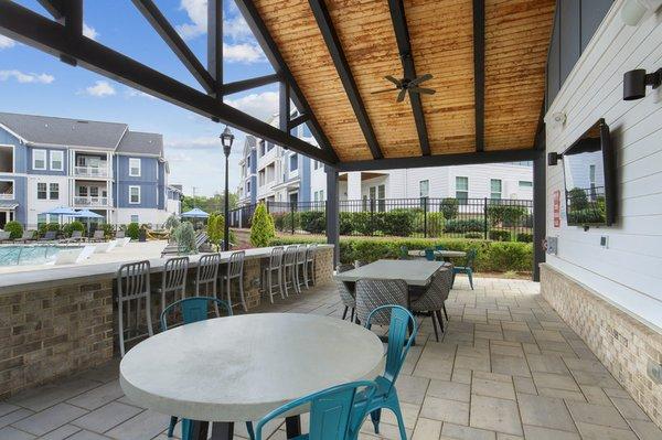 Covered patio overlooking the resort-style pool at Lantower Garrison Park.