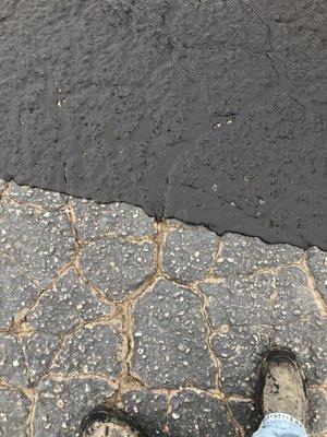 This is our fiber seal works great for cracked up asphalt area's