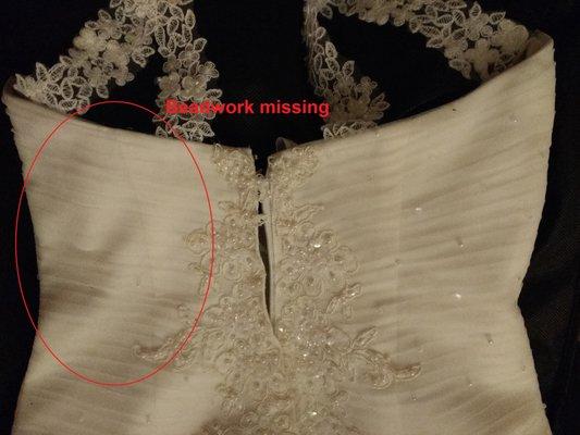 Left side of wedding dress is now missing beadwork. Jean had taken the bust in along the left seam.