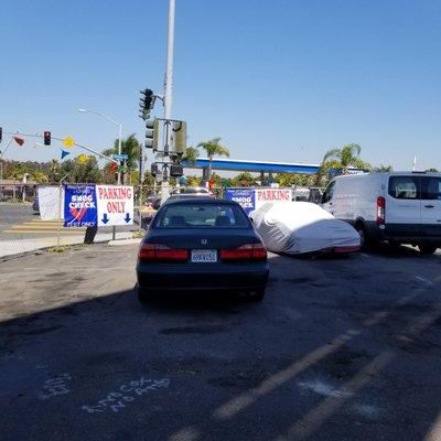 Don't worry about parking. There's plenty of room for various vehicles. Please Park your vehicle near the smog banner.