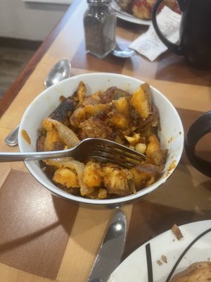 Home fries with sausage and hot peppers