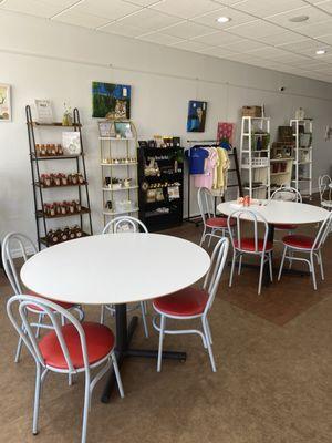 Seating and local artisan tables to shop from