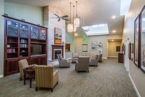 Multiple skylights in the living room bring in tons of natural light and the tall ceiling makes the room feel open and airy.