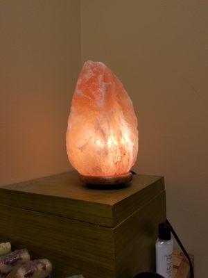 The soft glow of a salt lamp while you relax during your acupuncture treatment.