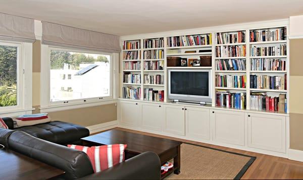 FAMILY ROOM WITH BUILT-IN SHELVING. - Represented as Buyers and then as Sellers.