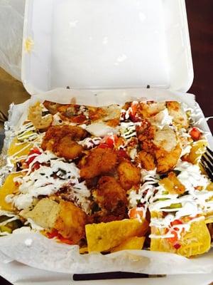 Fish Nachos. Don't forget to grab mango salsa to complete this!