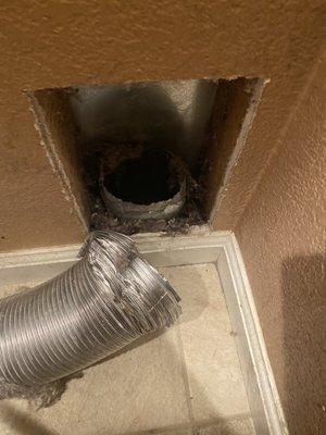 The tip of the vent squished to be shoved into the vent hole. Again.... no clamp around