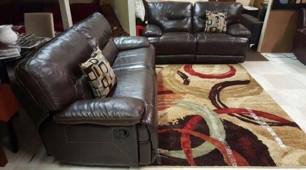 Cindy Crawford reclining genuine leather sofa set.