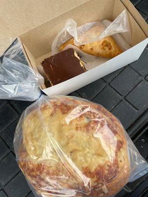 Parmesan onion bread, apple turnover and a buckeye brownie.