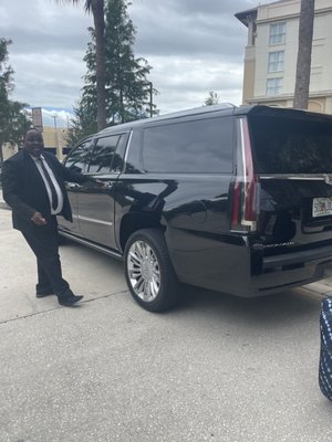 My driver, John opening my door for me.